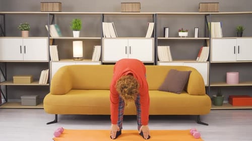 Fit and healthy woman does sports.