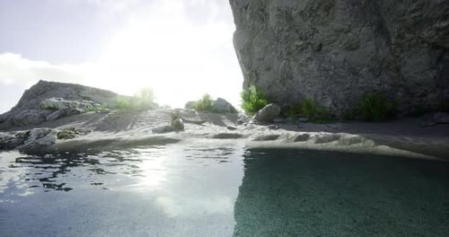 Serene Coastal Landscape at Sunrise with Water and Rocky Formations