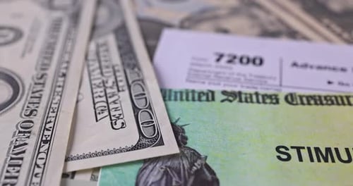 US Treasury Check and Currency Close Up