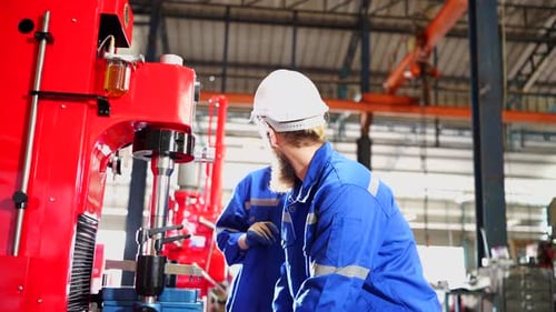 Heavy industry technology engineer Machine builder in hard hat and electrician manufacture worker