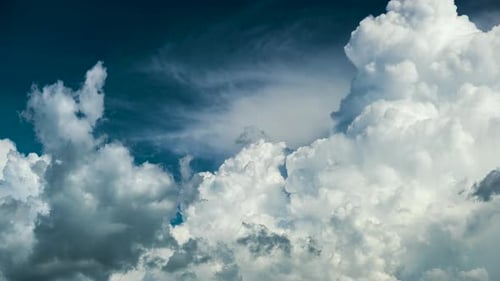 Timelapse of White Puffy Cumulus Clouds Forming on Summer Blue Sky