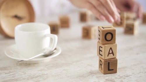 Setting Goals With Wooden Blocks