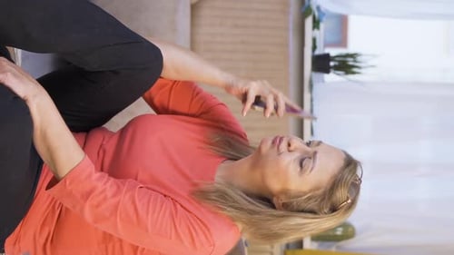 Woman Using Smartphone for Communication at Home