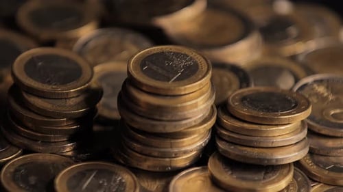 Shiny Euro Coins Piled in Stacks