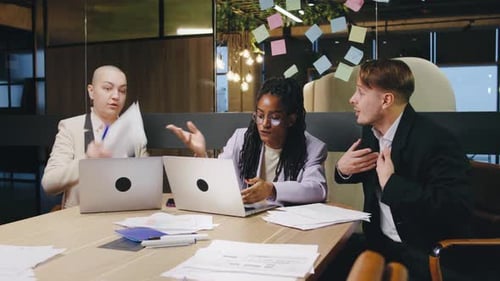 Businesspeople Arguing During a Meeting in an Office
