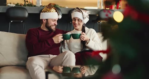 Couple Enjoying Christmas Together at Home