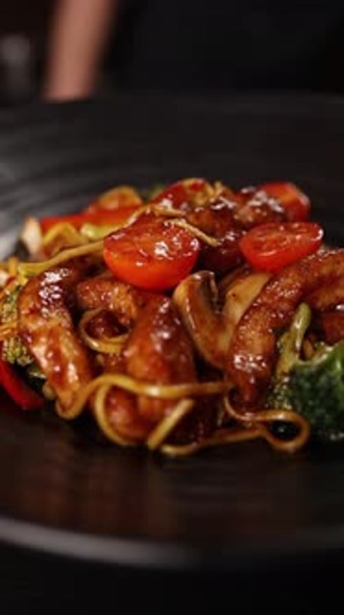 Close Up of Saucy Noodles and Fresh Vegetables