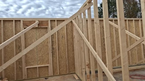 Construction Site Framework with Wooden Beams and Supports