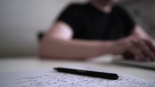 Creative Journaling: Man Working from Home Office