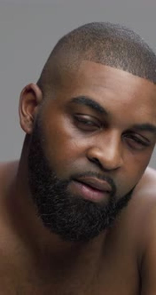 Studio, black man and face with skincare for hygiene, grooming and beauty with cosmetics treatment