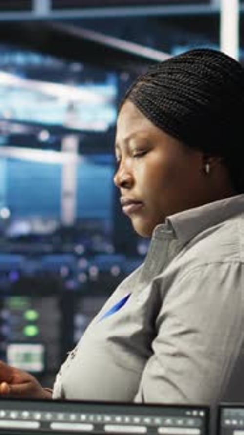Vertical Video Portrait of Joyous Server Hub Technician Using AI Visualization Insights