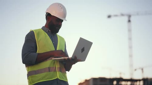 Foreman with Laptop in Construction Site Portrait of African American Man Happy Black Man Looking at