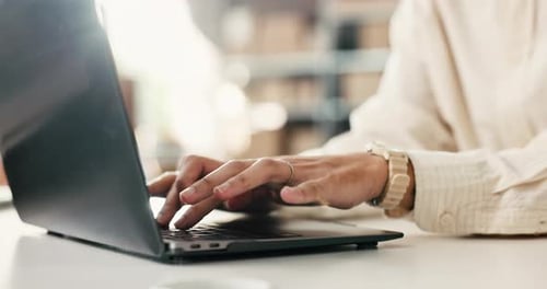 Typing, copywriter and hands with laptop in office, employee and research for email marketing