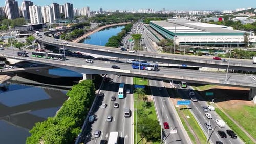 Cityscape of rush traffic jam at freeway road. Transportation scenery.