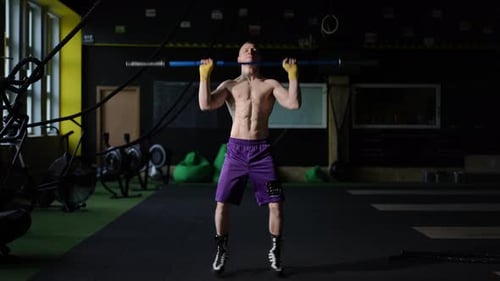 An Intense Weightlifting Session in a Modern Gym with Advanced Equipment and Dedicated Athletes