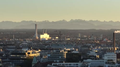 Cityscape of Munich with Alpine Background