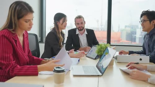 Group of multi-Ethnic businessman and businesswoman working in modern office.