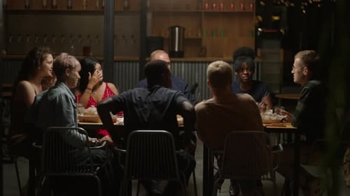 Group Of Multiethnic Friends In Restaurant In Summer Evening Diverse People Dinning In Open Terrace