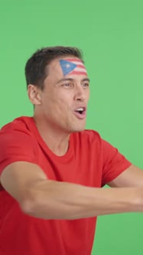 Excited Man Cheering with Flag on Green Screen