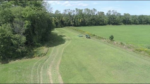Aerial view of a tractor in a field, United States.
