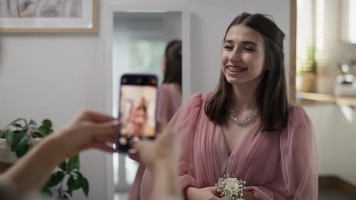 Teen Girl Posing in Formal Gown for Phone Photo