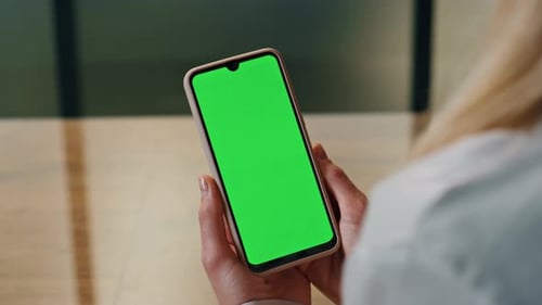 Lady Looking Green Display Phone Close Up