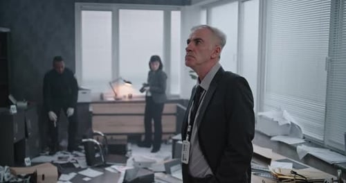 Detectives Investigating Chaotic Office Crime Scene