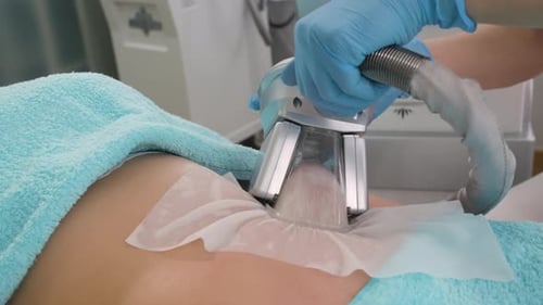 Medical Professional Administering Beauty Treatment with Machine