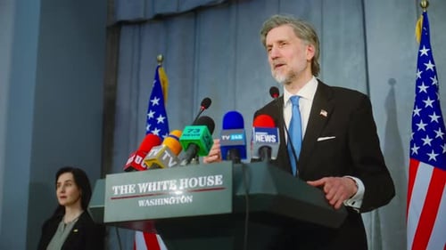 Man Giving Speech at White House Podium