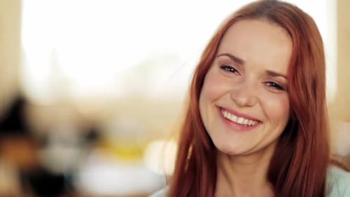 Smiling Woman Close Up With Red Hair
