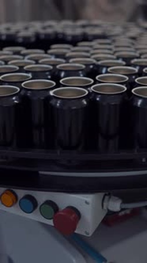 Beer Cans On Moving Conveyor In A Beer Factory Close Up