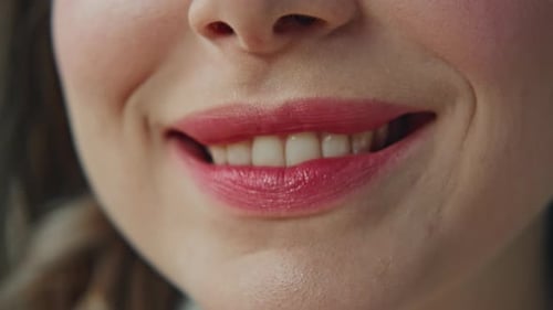 Smiling Woman Showing Teeth in a Close Up Shot