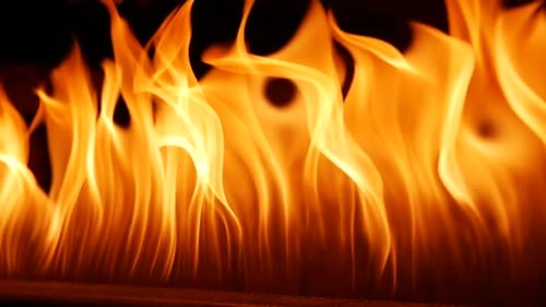 Captivating Flames Dance in Intense Orange and Yellow Hues