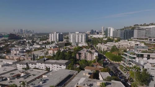 Aerial Shot of Various Buildings in Large City on Sunny Day Multistorey Luxury Hotels Los Angeles