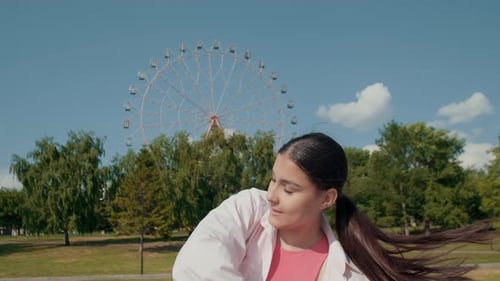 Girl Dancer Dancing Energetic Dance on the Street in Urban Atmosphere