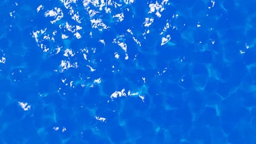 The Sea Water Surface Is Clear And Bottom