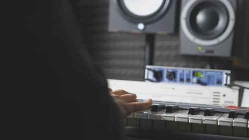 Hands of Male Musician Playing at Synthesizer Men Plays Solo of Music or New Melody Close Up Arms of