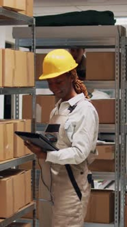 Vertical Video Young Woman Scanning Barcodes on Packages to Work
