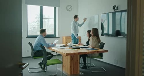 Business Meeting Presentation in a Modern Office