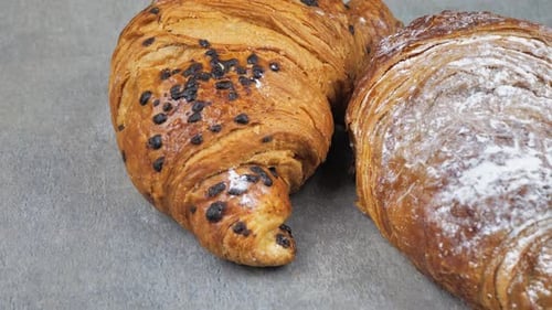 Closeup of a Croissant Spinning on a Turntable