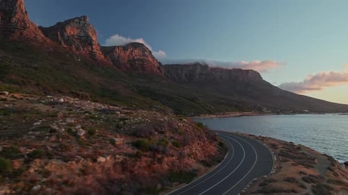 Sunset View Of 12 Apostles And Table Mountain National Park Through Victoria Road In Cape Town, Sout