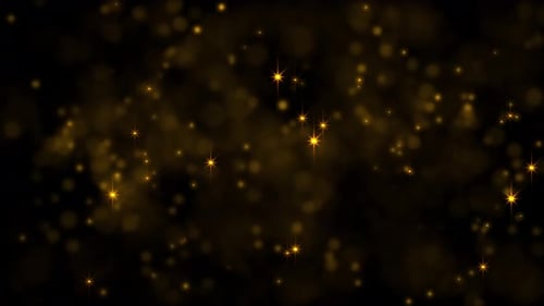 Wunderschöne golden schimmernde Partikel und Sterne und Bokeh. leuchtende Sterne auf schwarzem Hintergrund