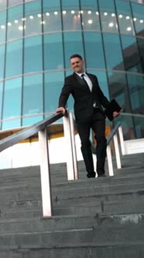 Vertical of Businessman Slide the Rail