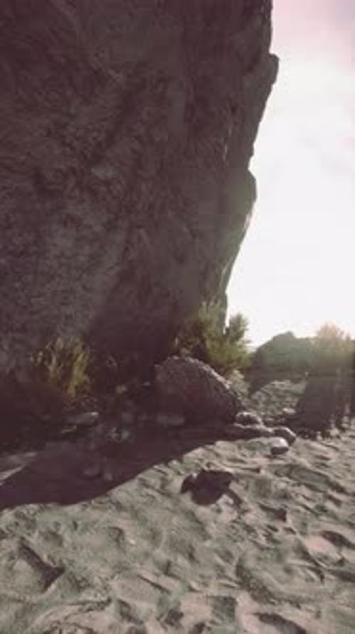 Rock Formation Among Sandy Terrain