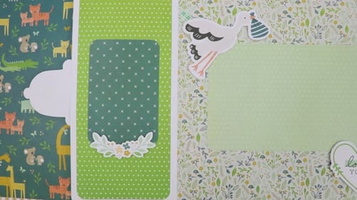Adorable baby album with animal-themed pages