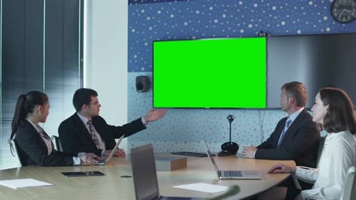 Team Of Office Workers Have Conversation in Conference Room.
