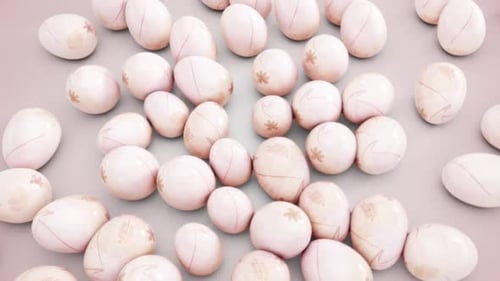 Decorative Easter Eggs Rolling Away to Reveal Content