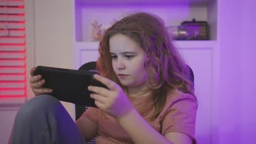 Gamer Child Holds Tablet Steady Gamer Kid Watches Video Gameplay Gamer Child Relaxes During Gaming