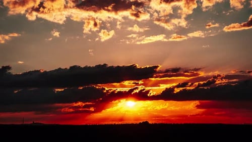 Dramatic Sunset Time-Lapse with Golden Light and Clouds