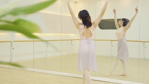 Expert ballerina ballet dancer training in studio perform elegant pose, dance elements positions in